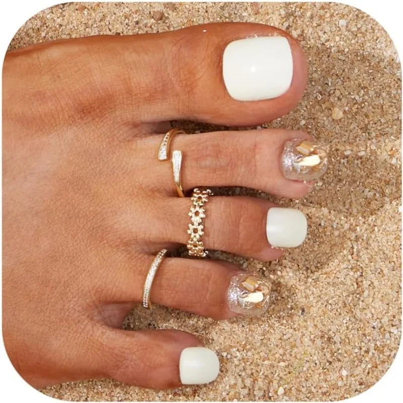 Flower toe ring trio worn on a foot