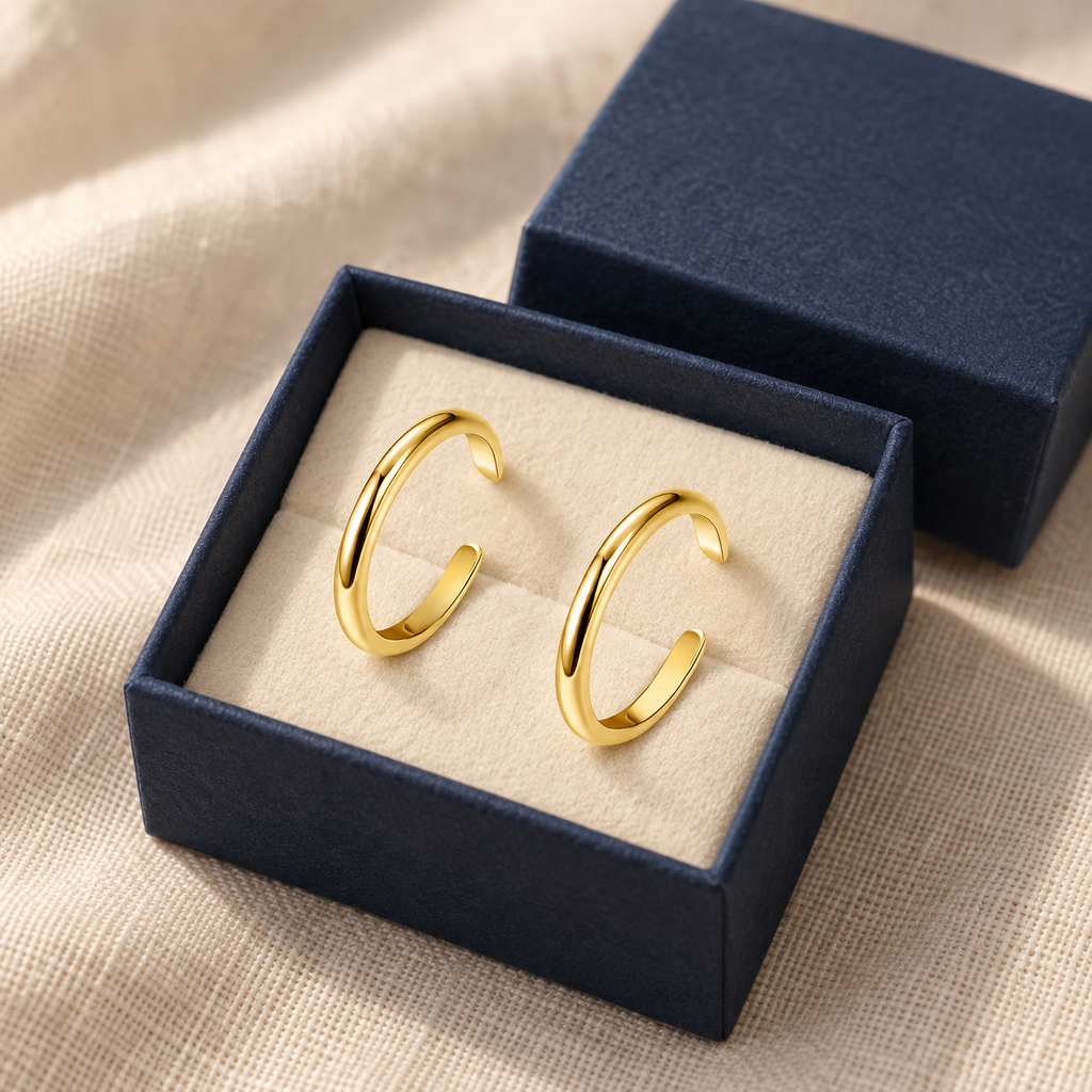 Two-piece adjustable toe rings in an open navy gift box
